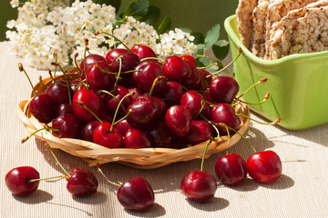 Fresh cherries and cereal biscuits