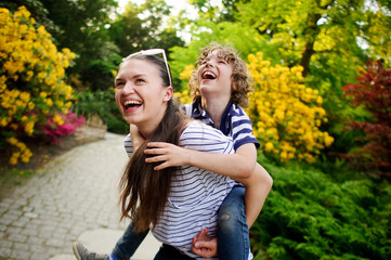 Girl on a walk with his younger brother