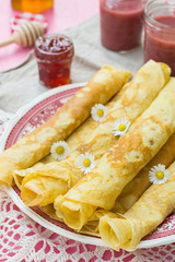 Thin pancakes crêpes with jam