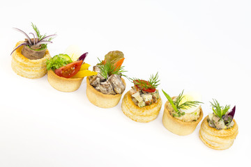 Mini Canape with meat and vegetables in plastic cups