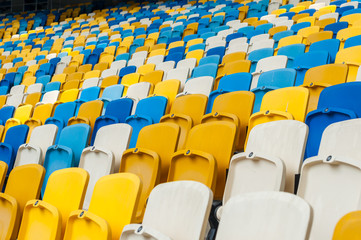 Empty plastic seats in a footbal or soccer stadium. 2016 sport background