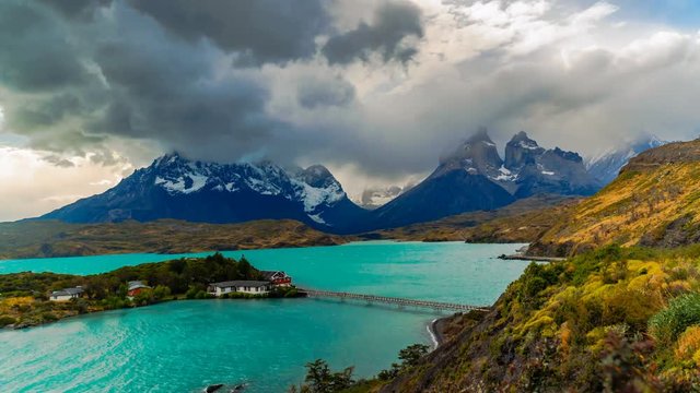 Aerial view of Lake Pehoe and rain clouds on the mountain in Torres Del Paine National Park Chile Time lapse 4K DCI