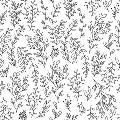 Seamless background with branches and leaves.