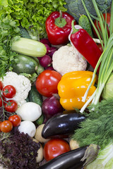 Background of fresh vegetables and greens closeup