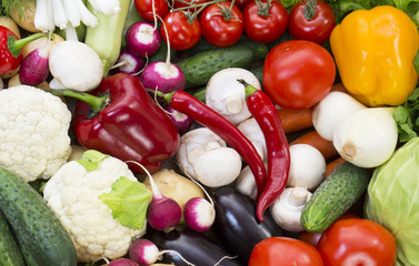 Background of fresh vegetables and greens closeup