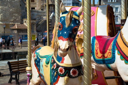 Bright vintage carousel in a French Honfleur.