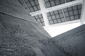 Horizontal Photo Modern Solar Panel with Blank Dark Concrete Blocks. Contemporary Building Architecture. Empty Abstract background. 