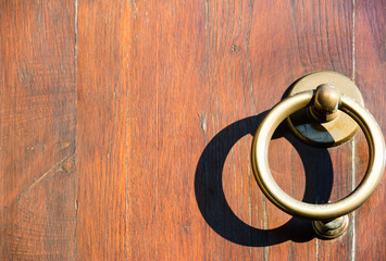 Clappers on a wooden door