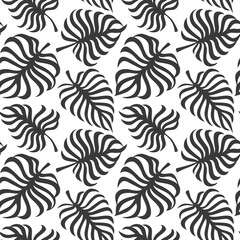 Seamless pattern with tropic leaves of monstera