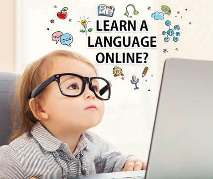 Learn A Language Online concept with toddler girl