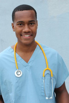 African-American black doctor man isolated on blue background.