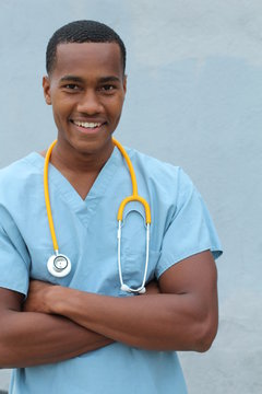 Closeup head shot portrait of confident healthcare professional crossing his arms 
