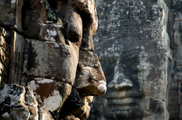 Two faces from Bayon the Heart of the Capital Angkor Thom