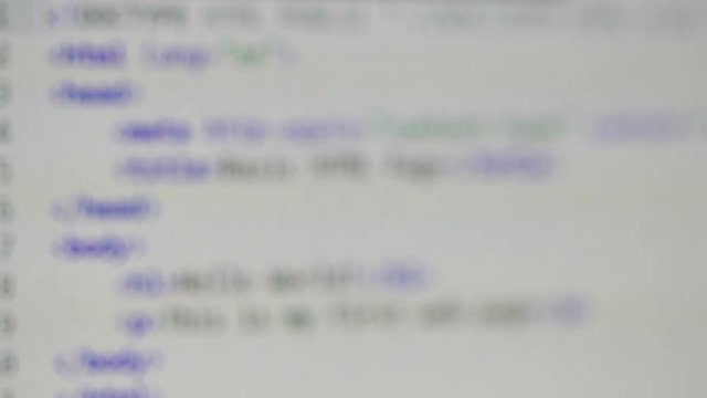 Computer screen shot close up while focusing on alternating pages of HTML, JavaScript, php and css code, blurry transitions on white background