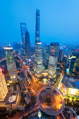 Night view of Lujiazui.  Since the early 1990s, Lujiazui has been developed specifically as a new financial district of Shanghai.