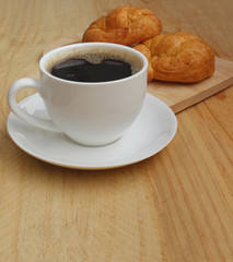 Cup of coffee and Croissant Breakfast Fast