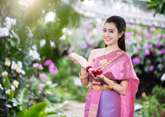 Naklejka na ściany i meble Beautiful Thai girl in Thai traditional costume