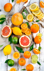 Citrus fruits on a wooden table.