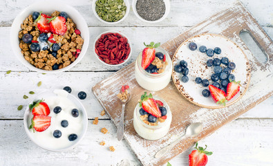 Obraz na płótnie Canvas Yogurt, muesli, fresh berries