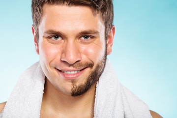 Happy man with half shaved face beard hair.