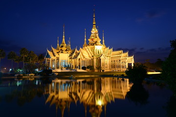 Fototapeta premium Amazing Wat Thai after sunset in Korat, Thailand. Awaiting for twilight.