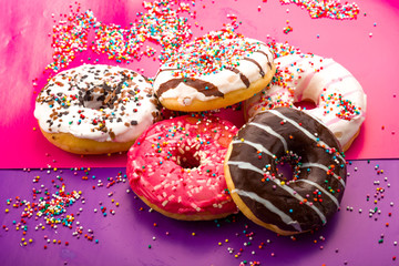 Donuts on color background.