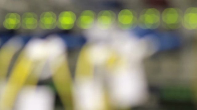 blinking LEDs on optical converters showing big traffic, blurred technology background