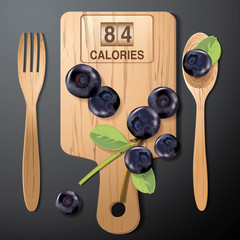 Vector of Calories in blueberries on wood board with wood spoon