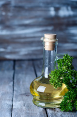 Fototapeta na wymiar Olive oil with herbs