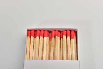 Empty paper matchbox with wooden matches on it. Matchbook case p
