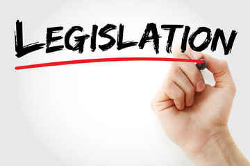 Hand writing Legislation with red marker, business concept