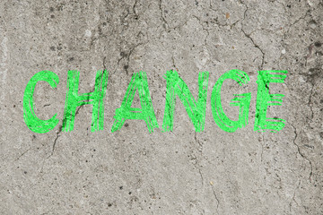 Neon green word text change business concpet on a concrete background
