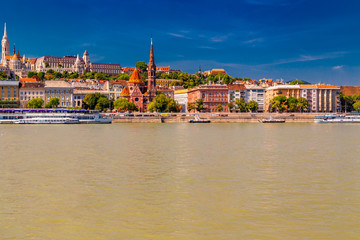 Fototapeta premium Modern and ancient buildings on the Danube River