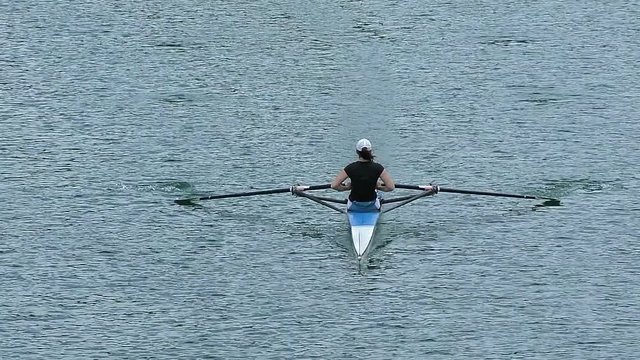 Young girl rowing, slow motion full HD video