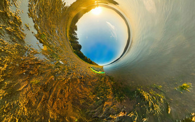 kayak on river coast. Stereographic panorama, little planet