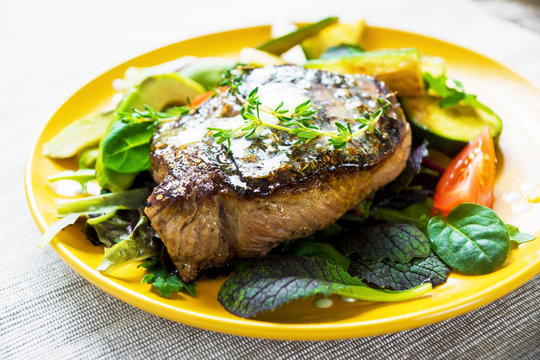Grilled beef steak with  herb buter and vegetable