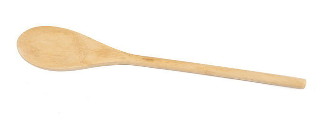 Top view of used wooden spoon isolated