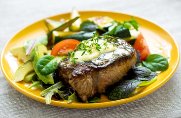Grilled beef steak with  herb buter and vegetable