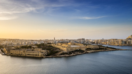Fototapeta na wymiar Malta - Panoramic view of Malta and Fort Manoel from Valletta at blue hour