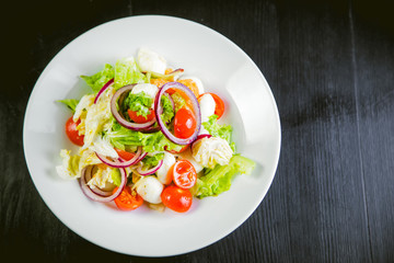 delicious vegetarian salad, salad with fruits and vegetables