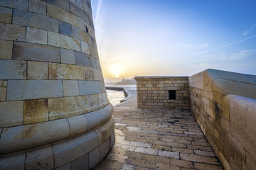 Malta - The Lighthouse at at Breakwater of Valletta at sunset