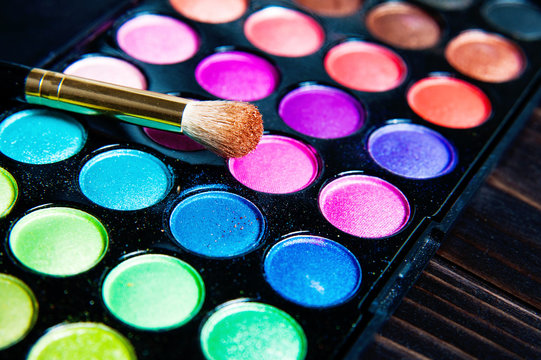Makeup palette with brush.