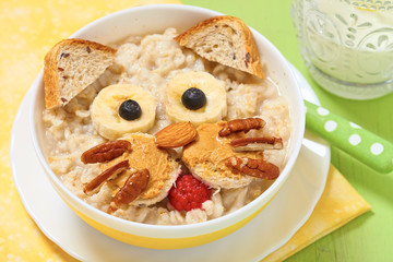 Funny oatmeal with cat face decoration