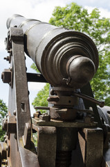 Fototapeta na wymiar old cannon on a gun carriage