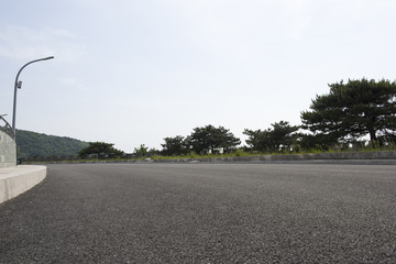 Driving on the long Road in nature.