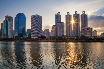 Fototapeta na wymiar Building and the morning light at Benjakiti Park in Bangkok, Thailand.