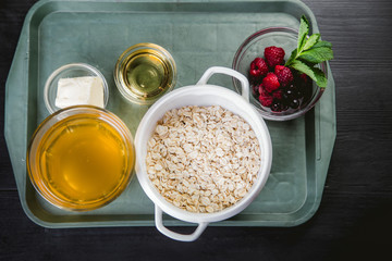 ingredients for oatmeal with berries and honey