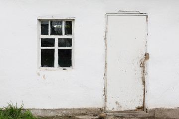 Obraz na płótnie Canvas Old window in a village house