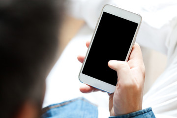 Young man using cell phone