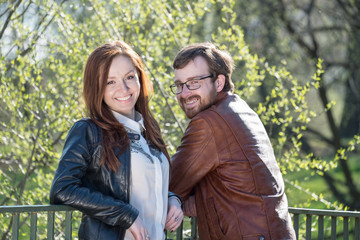 Fototapeta premium Young couple on bridge